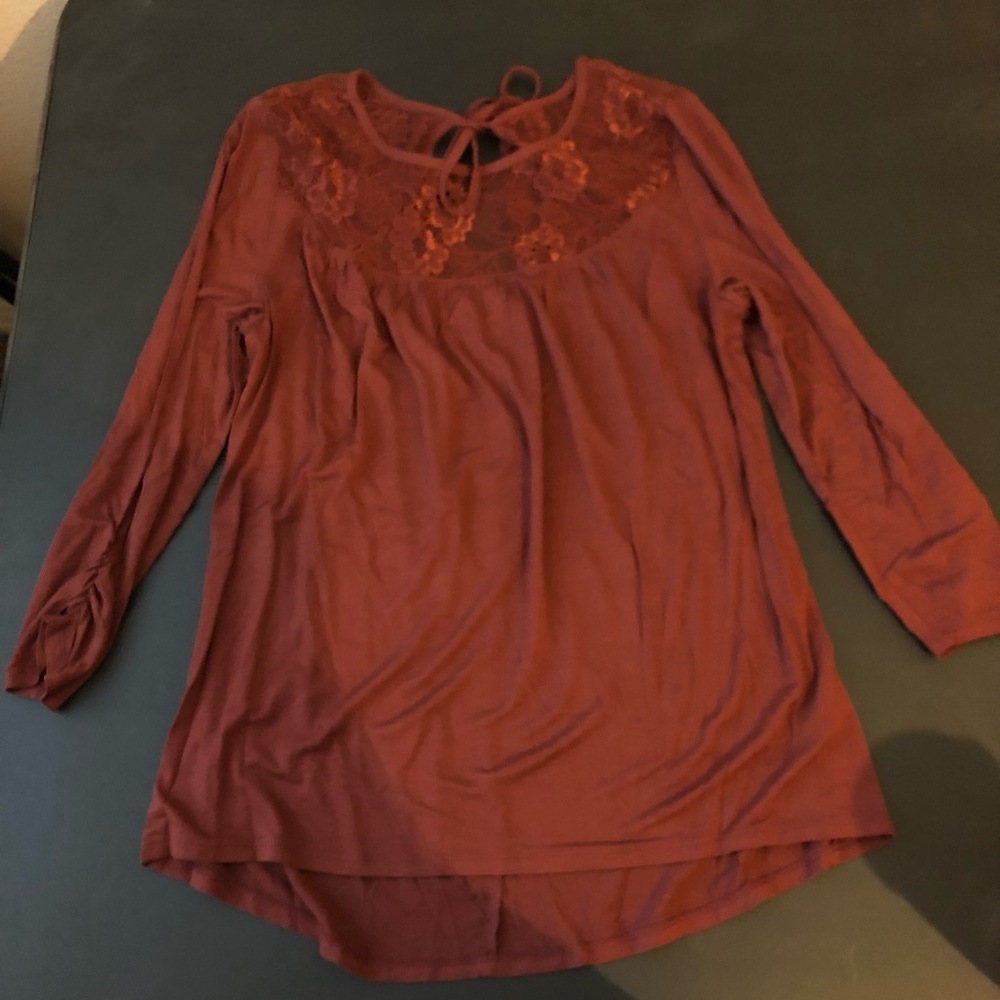 3/4 sleeve top with cute lace detail on top and tie back